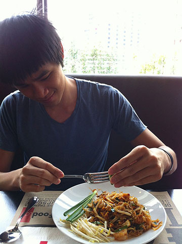 Aaron eating pad thai Aaron eating pad thai